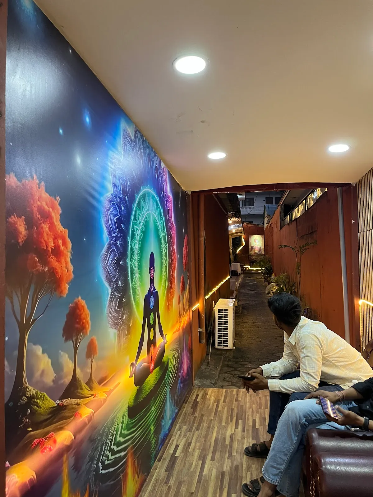 Hand-painted meditation mural at the entrance corridor.